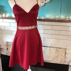 Red embellished cocktail dress. New with tag.